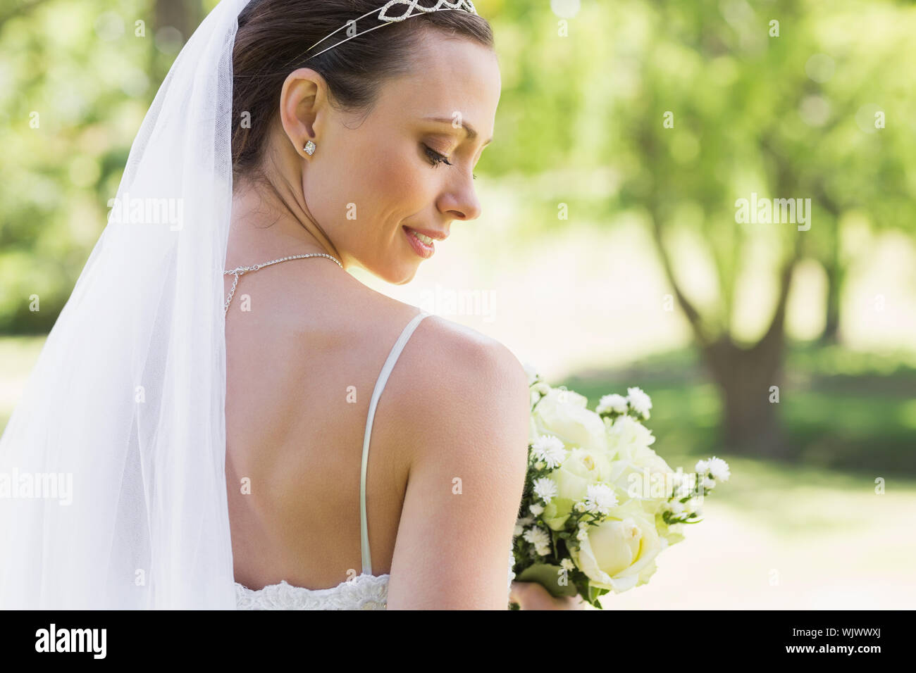 Rear view smiling bride hi-res stock photography and images - Alamy