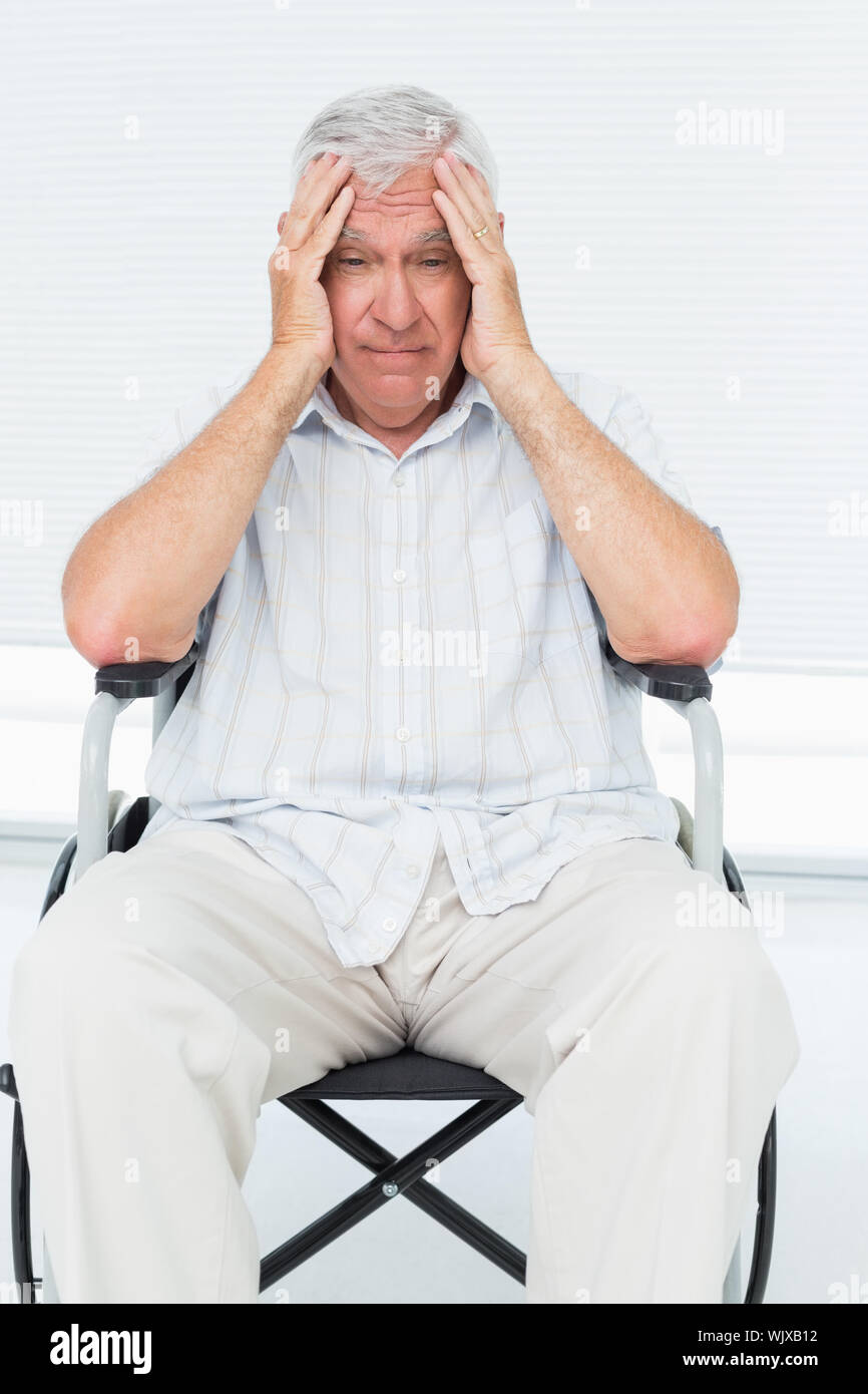 Wheelchair thinking elderly man hi-res stock photography and images - Alamy