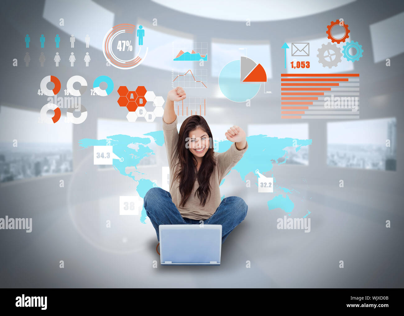 Digital composite of cheering girl using laptop with interface Stock ...