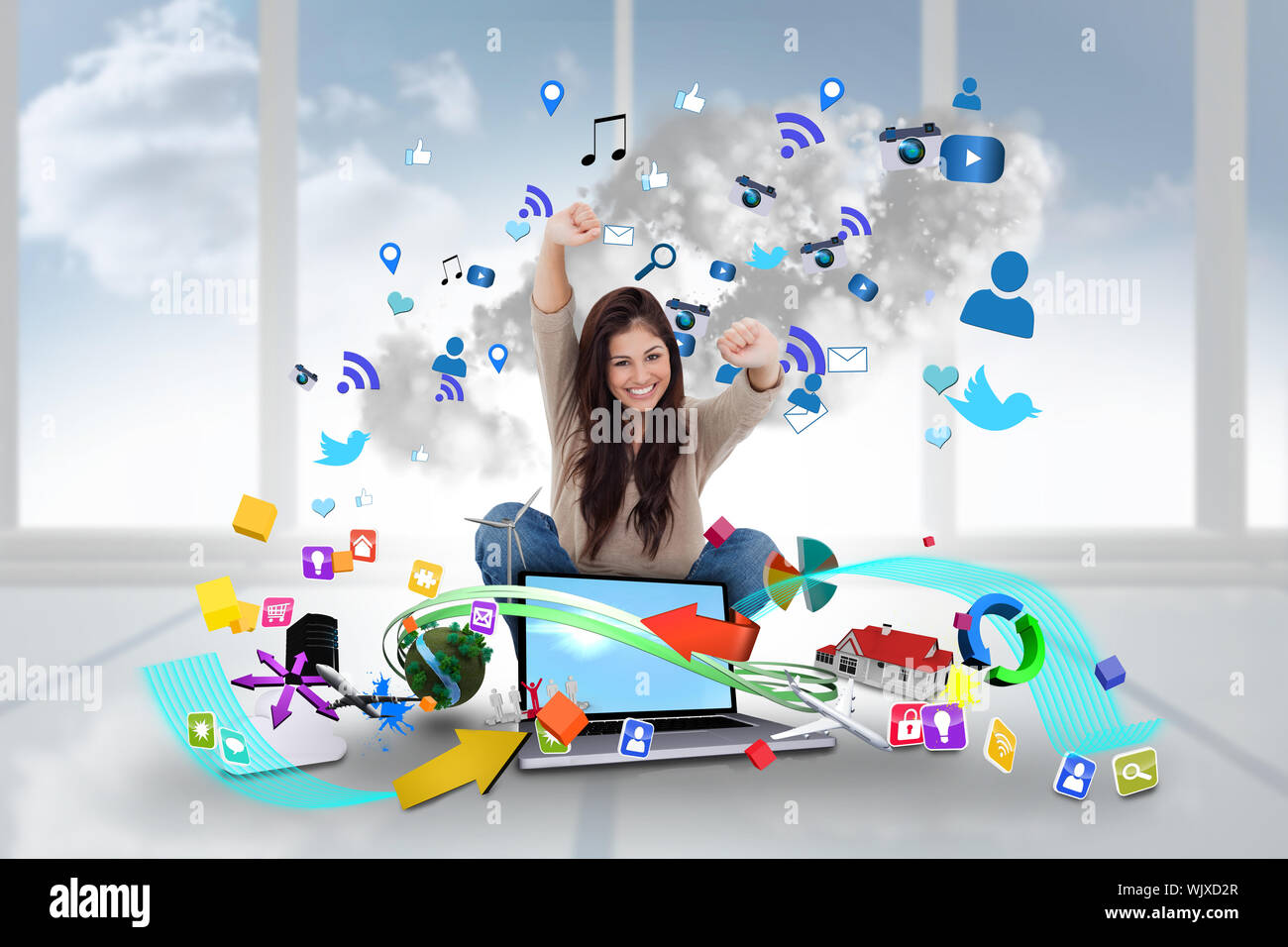 Digital composite of cheering girl using laptop with app icons Stock ...