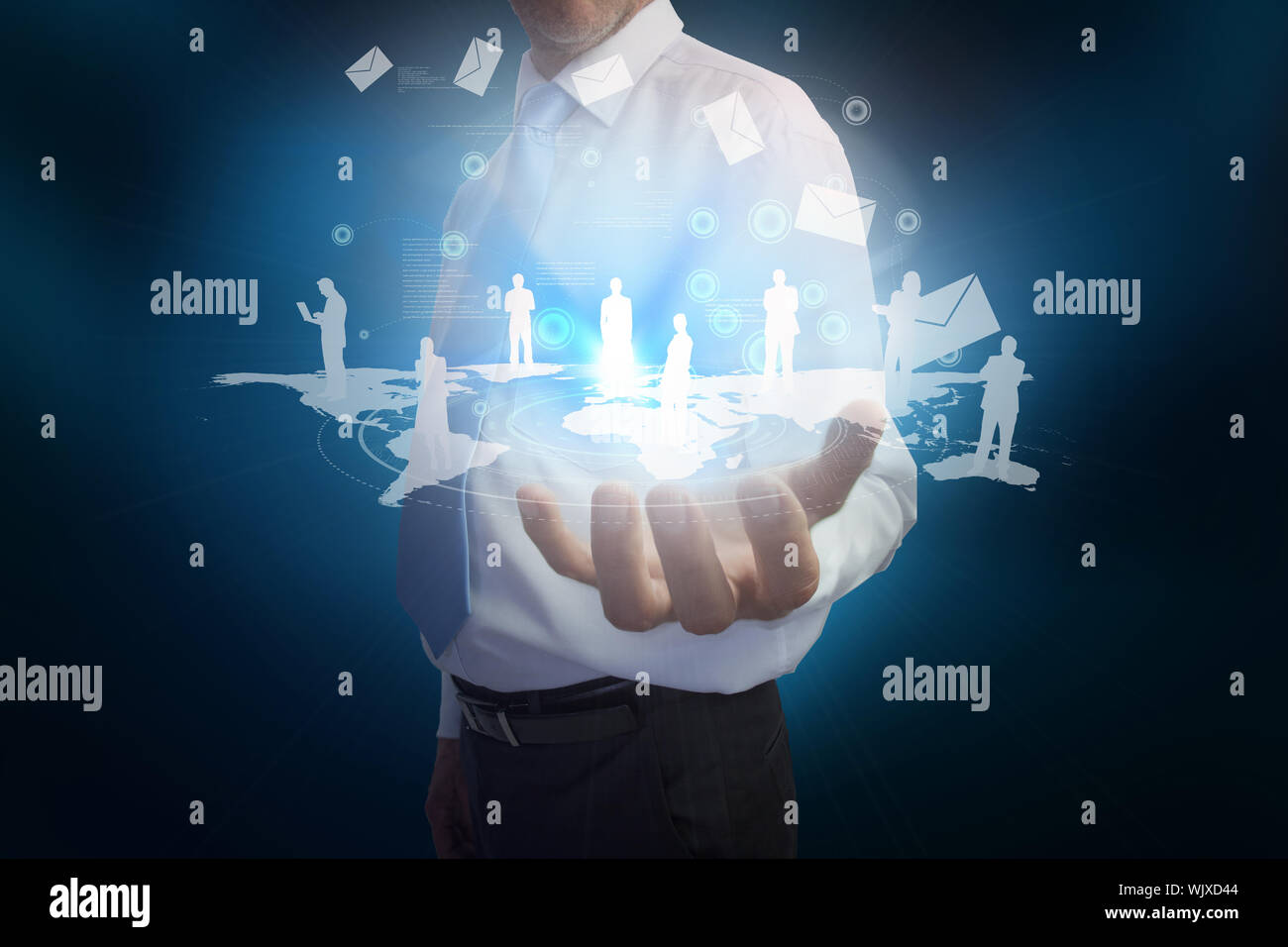 Digital composite of businessman presenting map with email and human representations Stock Photo