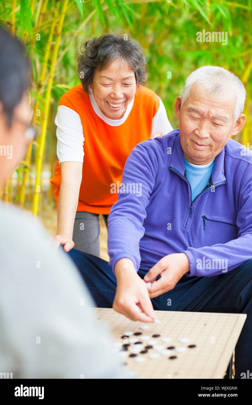 seniors play traditional chinese board game Go Stock Photo Alamy