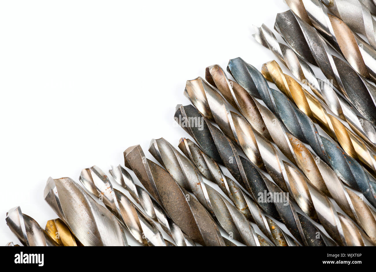 Various used twist drill bits in a row Stock Photo