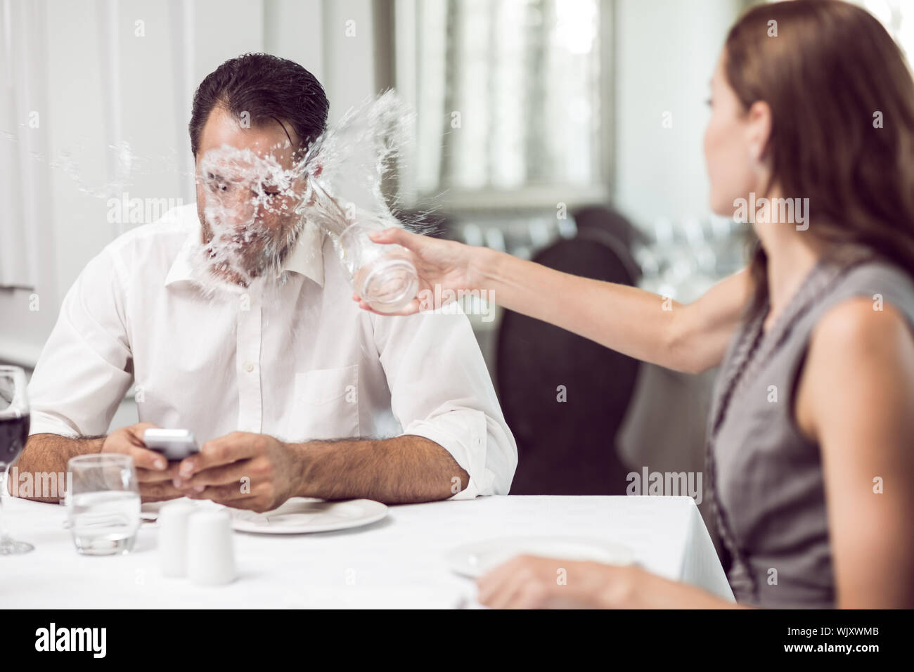 Angry woman restaurant on table hires stock photography and images Alamy