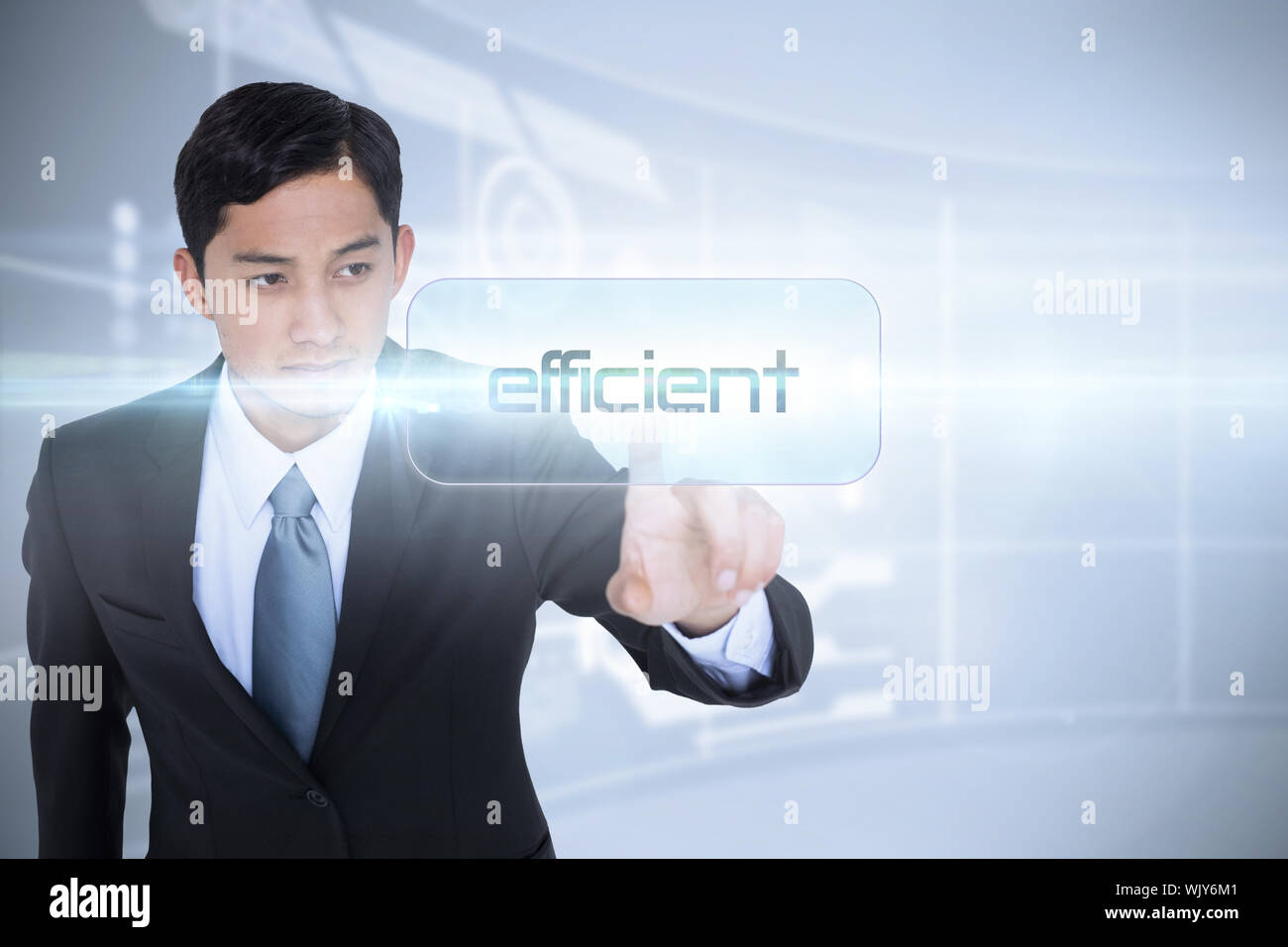 The word efficient and unsmiling asian businessman pointing against futuristic technology interface Stock Photo