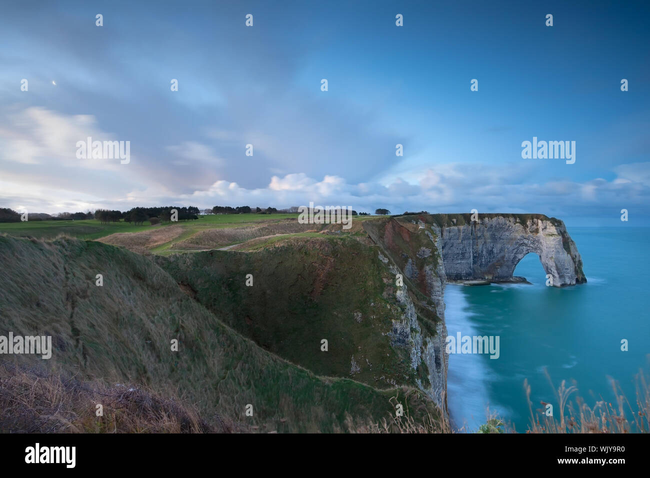 cliffs and Atlantic ocean in dusk, Etretat, France Stock Photo - Alamy