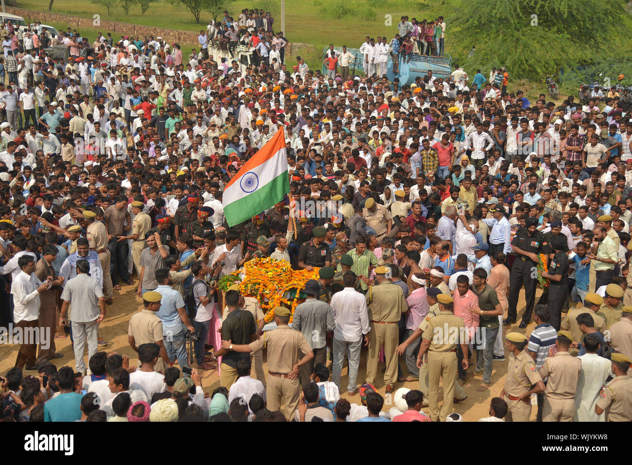 Ajmer, India. 03rd Sep, 2019. People carry the mortal remains of army