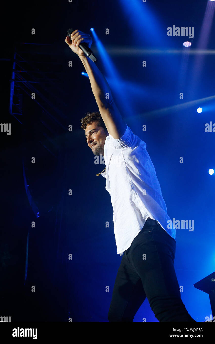 Calvia, Mallorca / Spain- August 31, 2019: Spanish singer David Bisbal performs live during his 2019 promotion tour near the village of Calvia in the Stock Photo