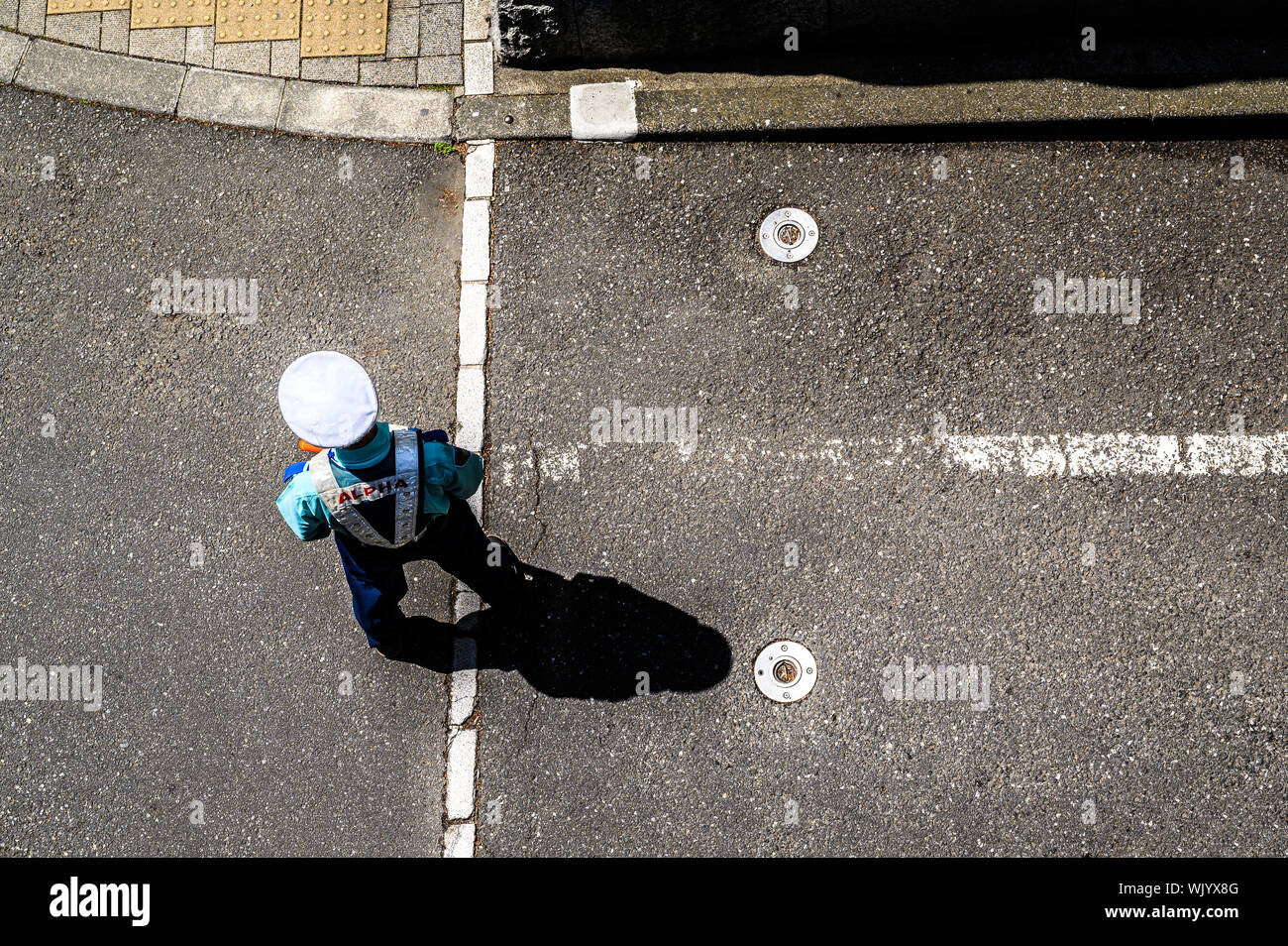 Bird's-eye view of a policeman on the street, Shinjuku, Tokyo, Japan Stock Photo