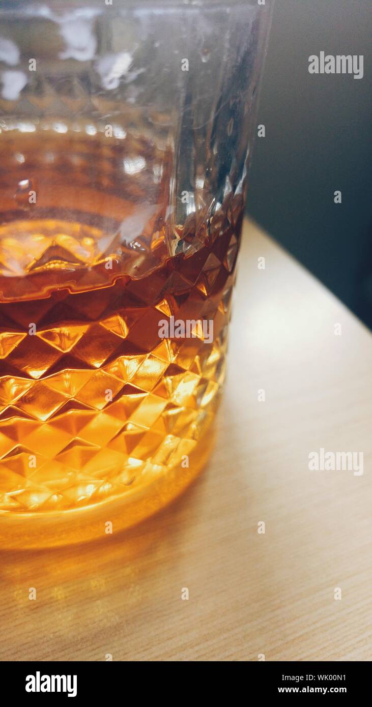 Close-up Of Whiskey In Glass On Table Stock Photo