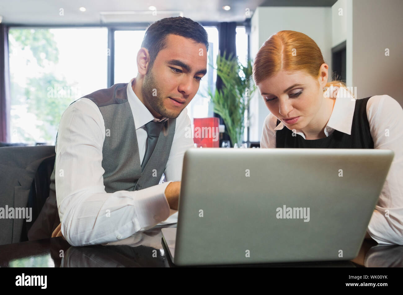 Business people working together on laptop Stock Photo