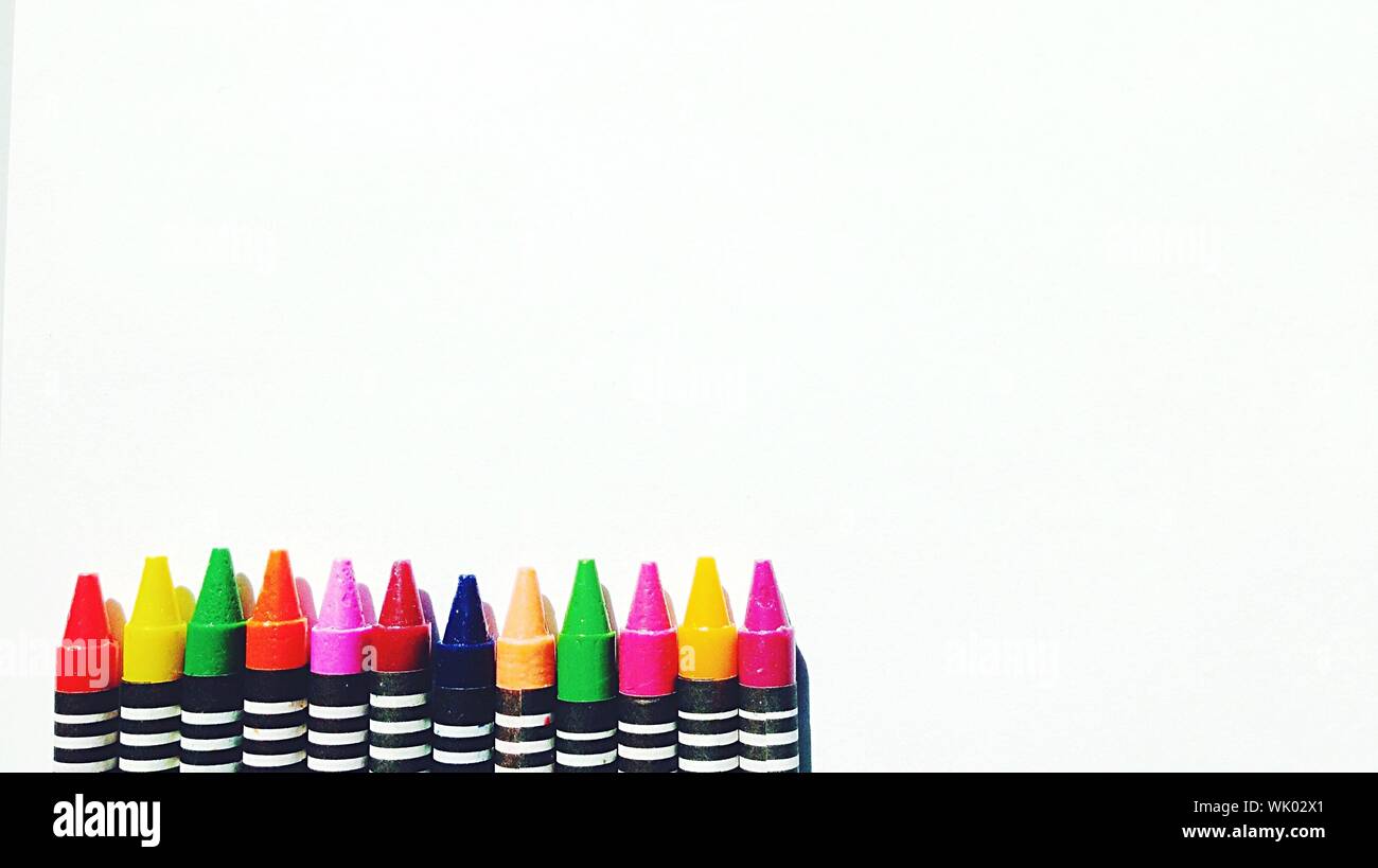 Multi Colored Crayons Against White Background Stock Photo Alamy