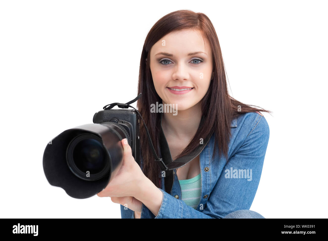 Casual young photographer posing Stock Photo
