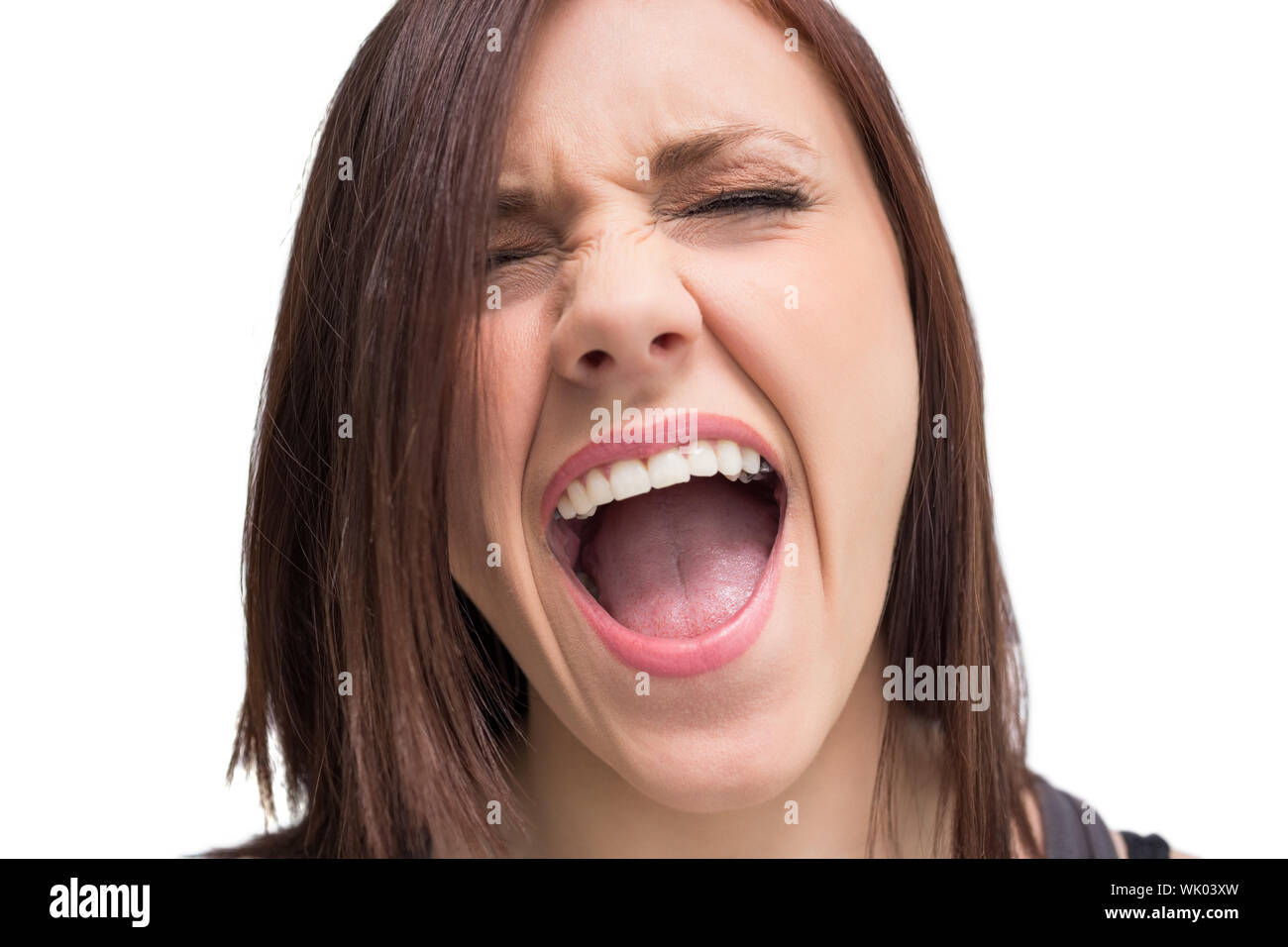 Close up on pretty brunette shouting Stock Photo