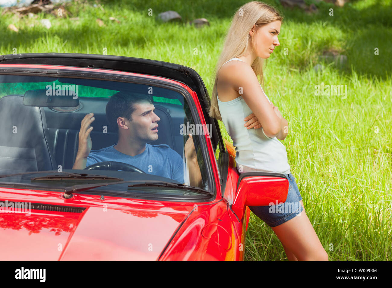 Young couple having a dispute while going on holidays Stock Photo