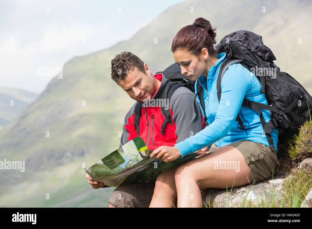 Woman man hiking map hi-res stock photography and images - Alamy