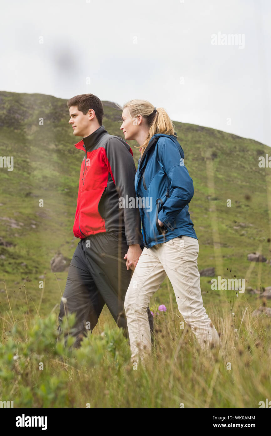 Man woman female couple walking hiking hi-res stock photography and ...