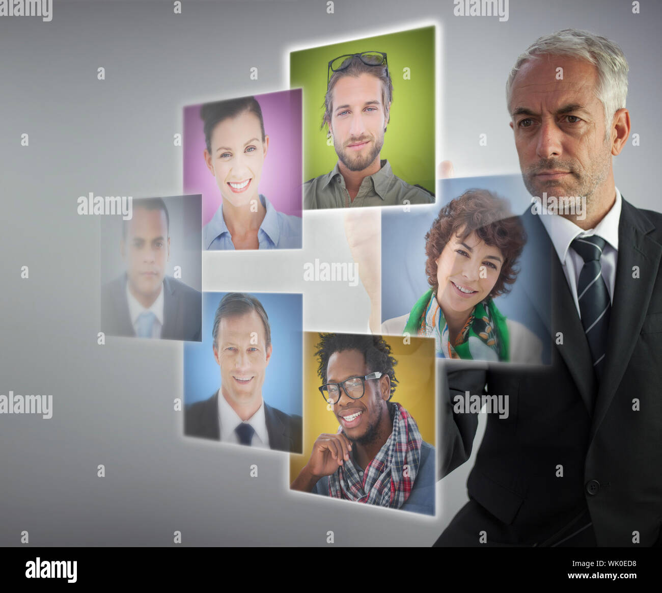 Mature human resources director selecting future employees Stock Photo