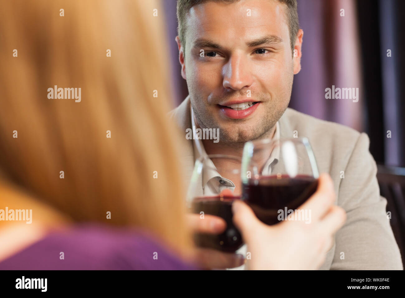 Happy couple having dinner together Stock Photo