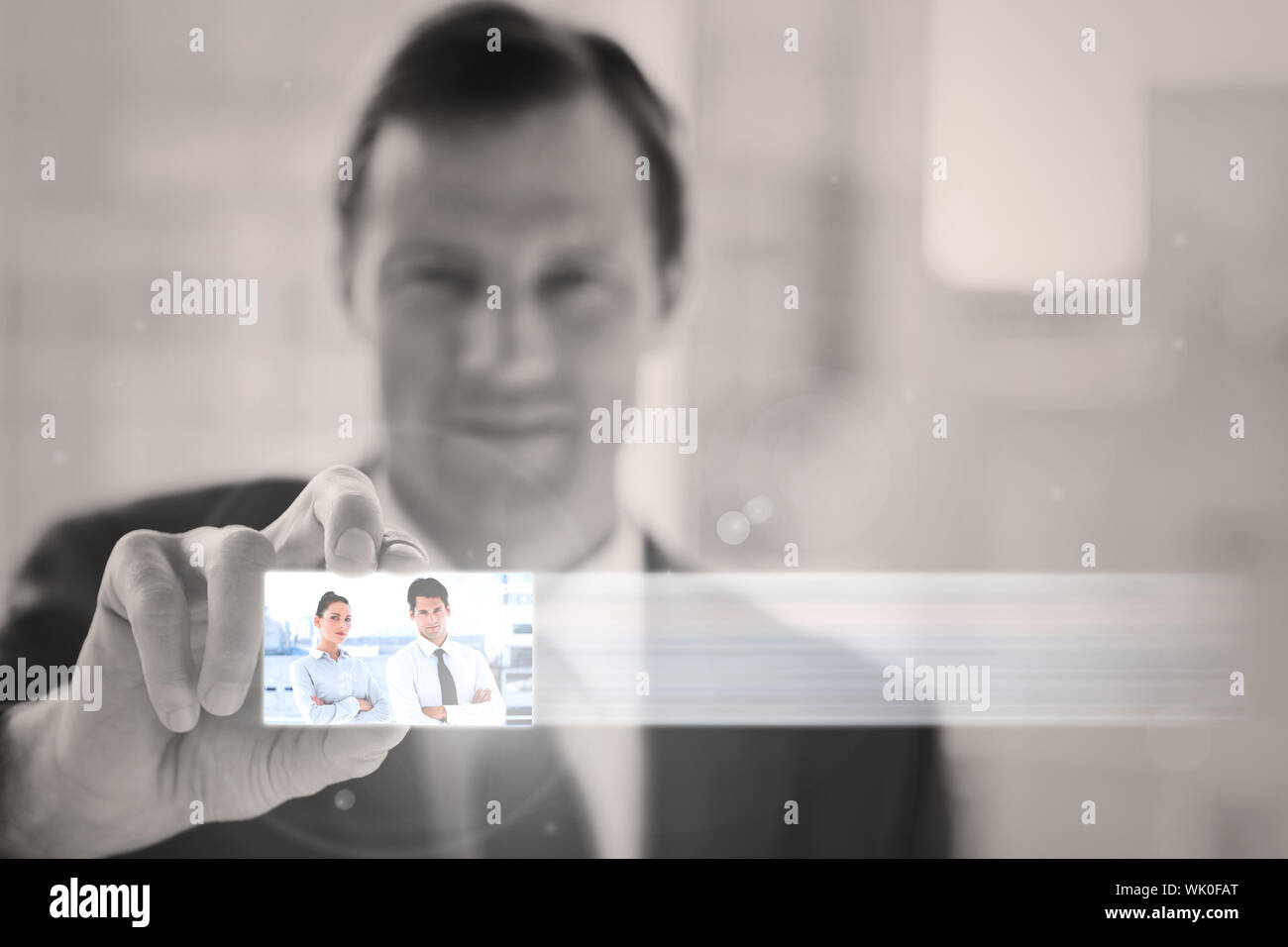 Classy businessman presenting digital interface Stock Photo