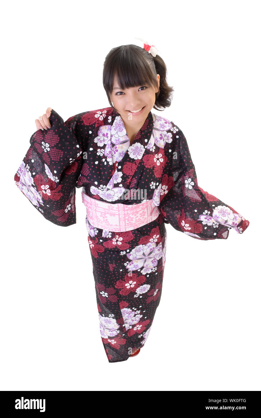 Cute japanese girl with traditional clothes smiling against white ...