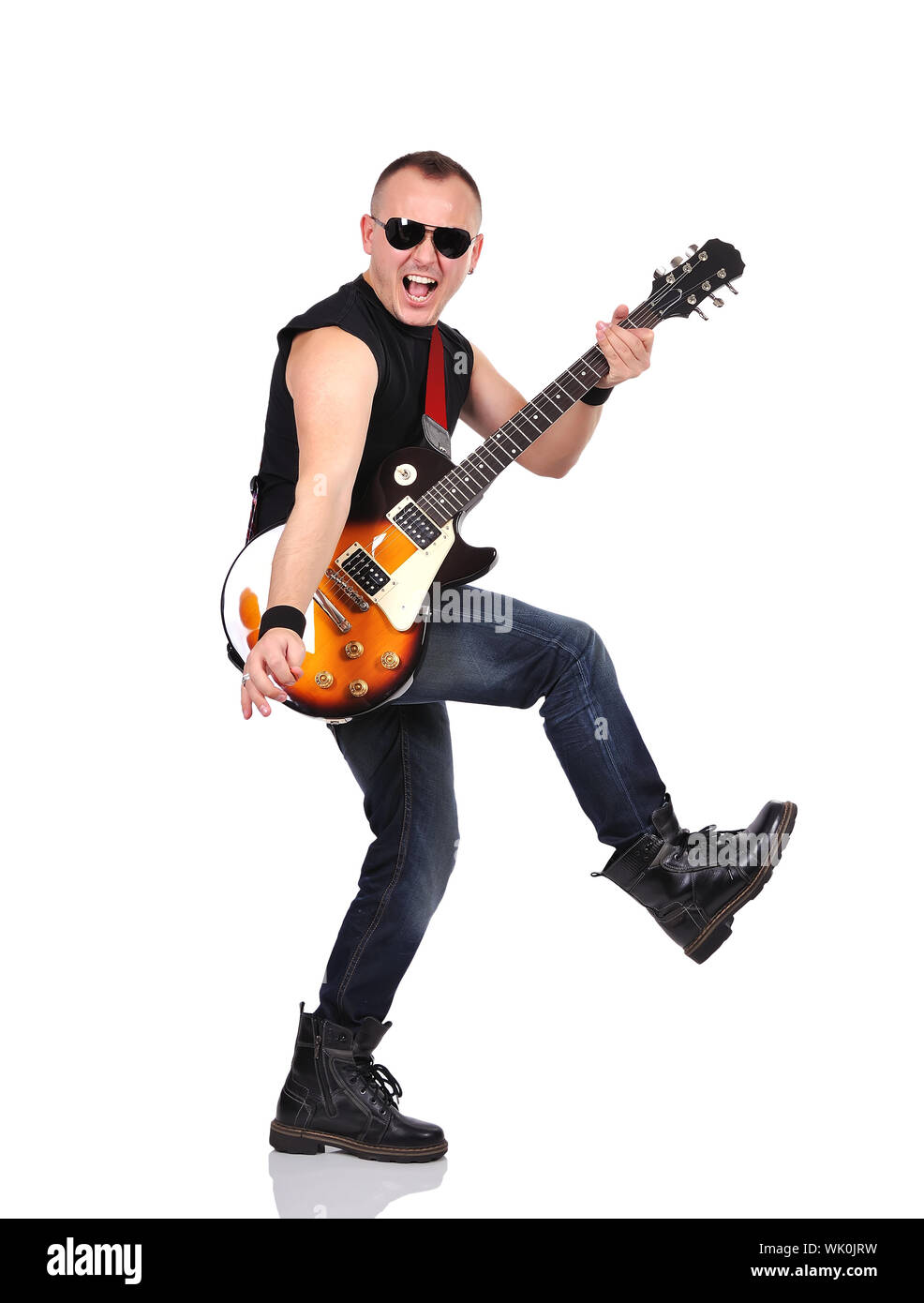 rock musician is playing on electrical guitar Stock Photo Alamy