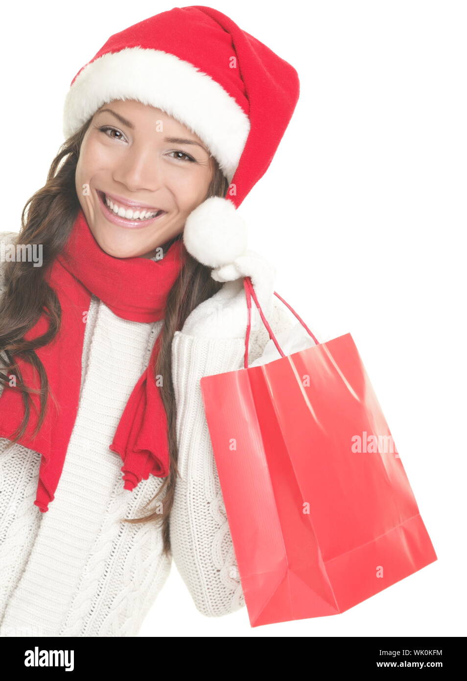 Christmas shopping woman isolated on white background Stock Photo - Alamy