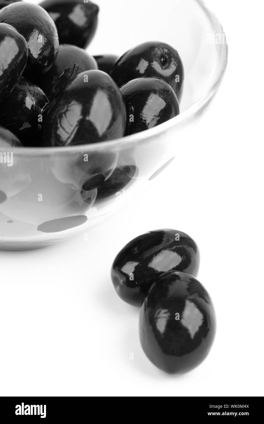 bowl of black olives isolated on white background Stock Photo Alamy