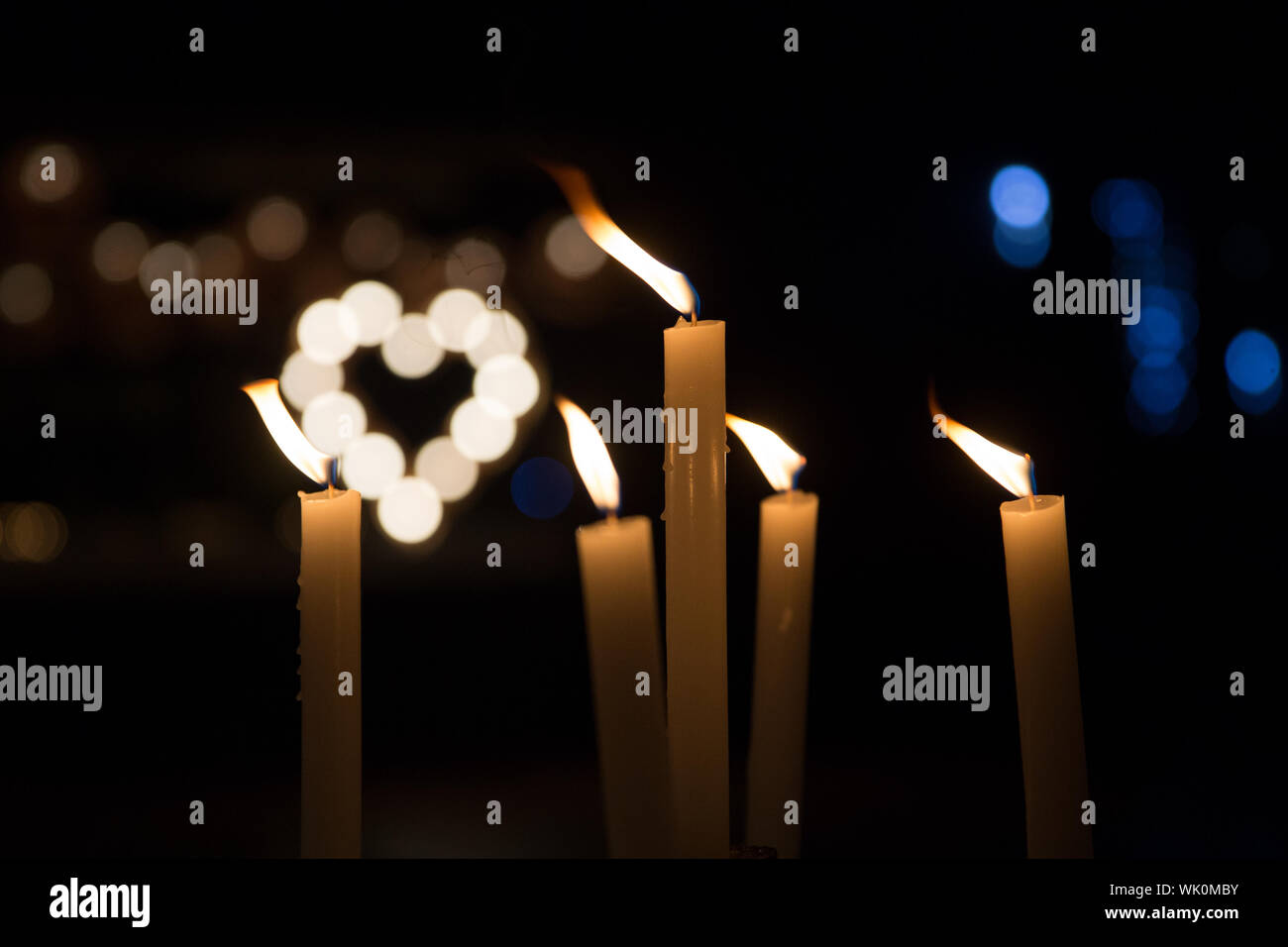 Closeup Of Lit Candle In Dark Room Stock Photo Alamy