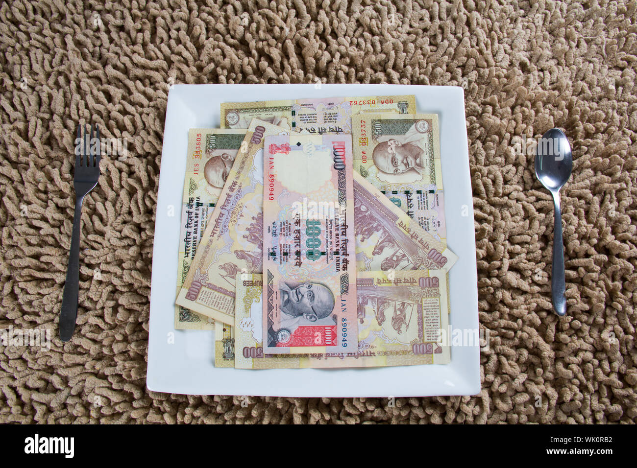 Indian banknote represent food budget Stock Photo