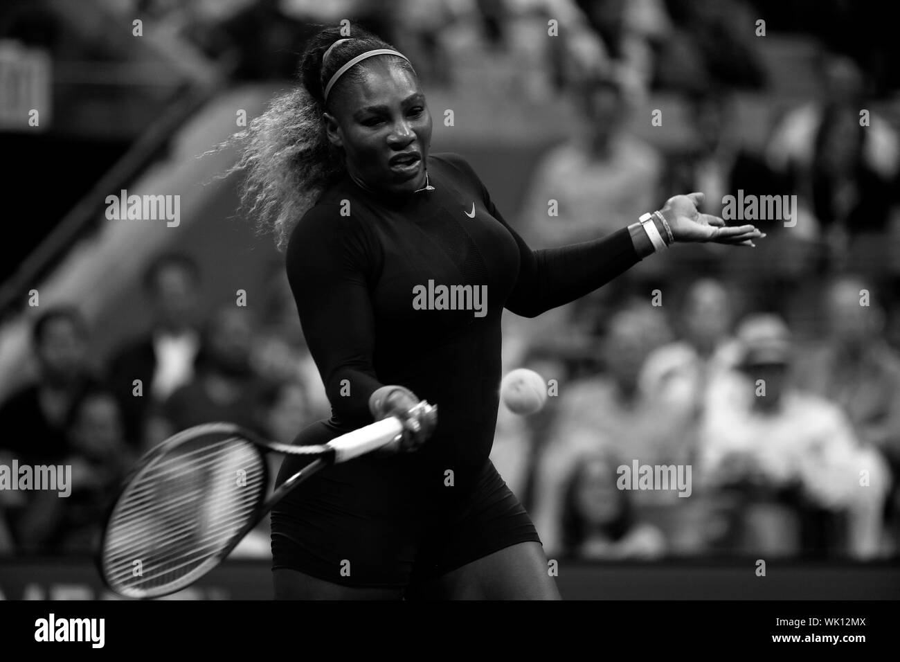 Flushing Meadows, New York, United States - 3 September 2019. Serena Williams strikes a forehand to Wang Qiang of China during their quarter final match at the US Open in Flushing Meadows, New York.   Williams won the match to record her 100th US Open match victory. Credit: Adam Stoltman/Alamy Live News Stock Photo