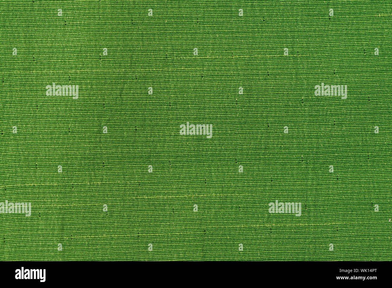 Closeup detail of green fabric texture background Stock Photo - Alamy