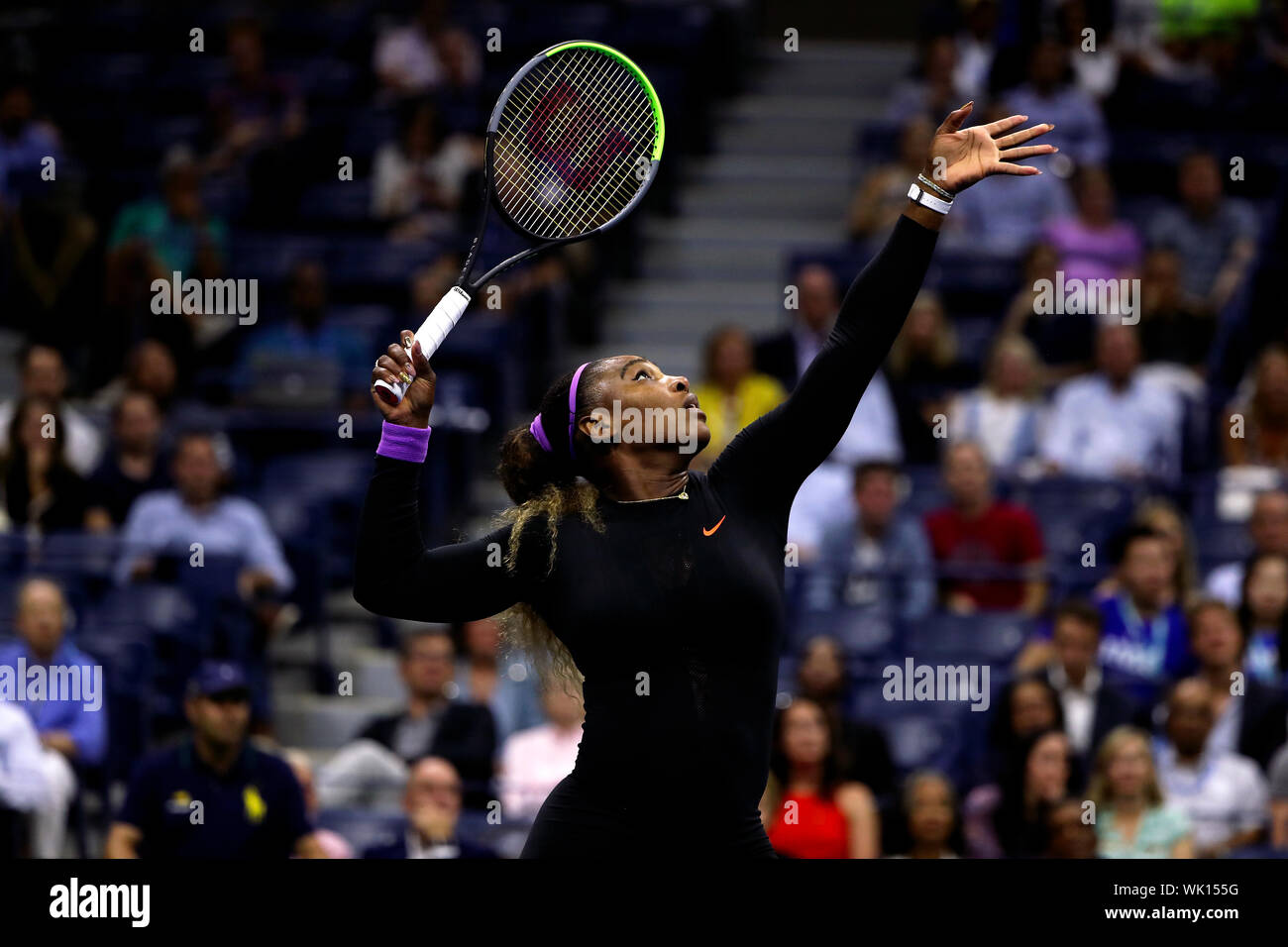 Flushing Meadows, New York, United States - 3 September 2019. Serena Williams sets up an overhead against Wang Qiang of China during their quarter final match at the US Open in Flushing Meadows, New York.   Williams won the match to record her 100th US Open match victory. Credit: Adam Stoltman/Alamy Live News Stock Photo