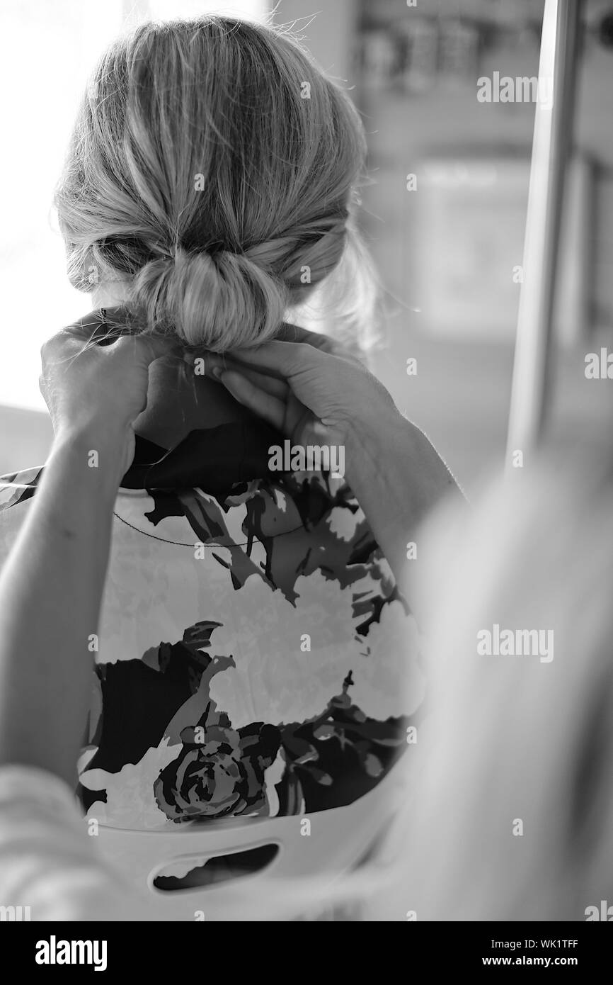 Tying bun hires stock photography and images Alamy