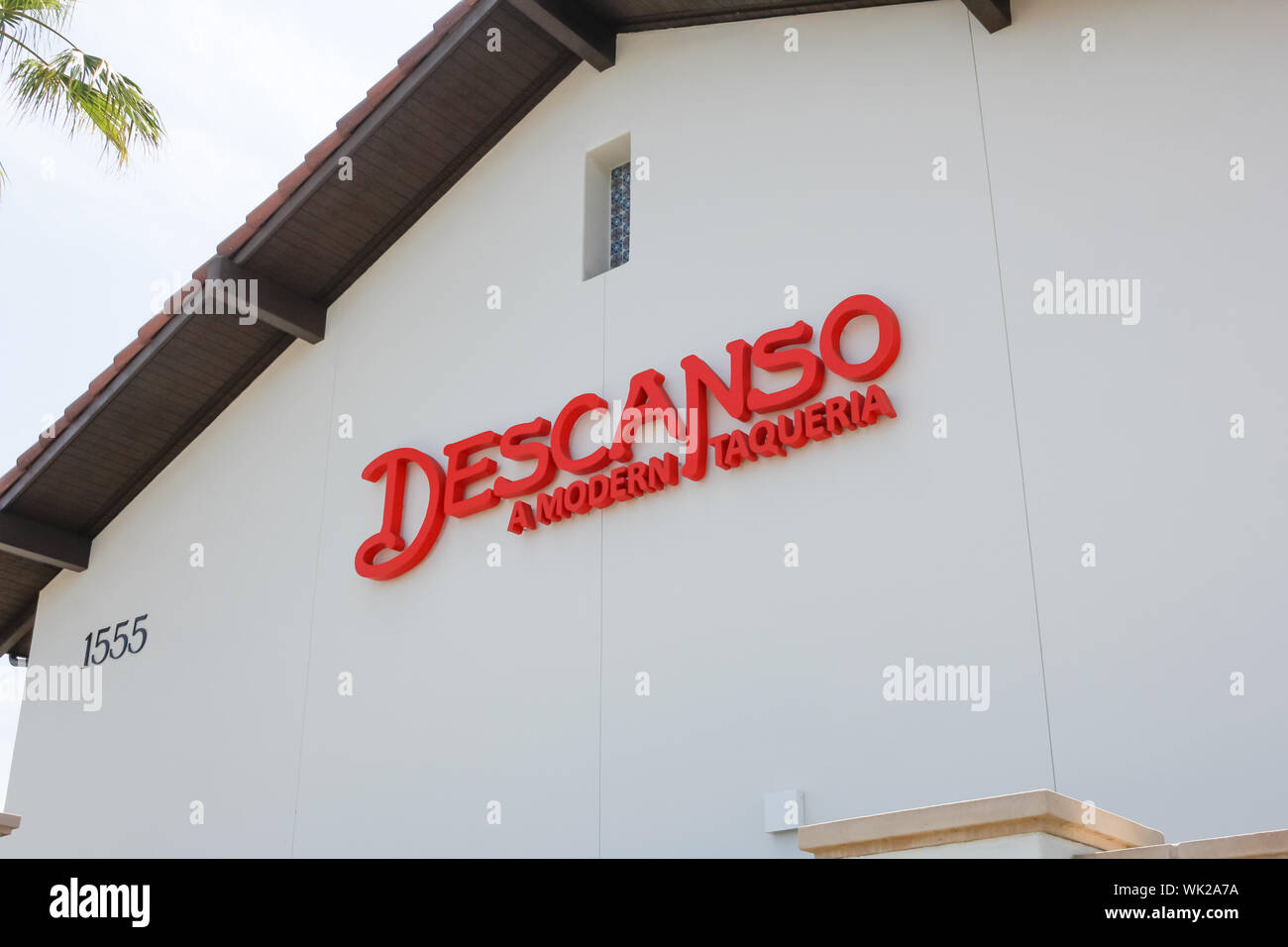 A store front sign for the Mexican restaurant known as Descanso A Modern Taqueria Stock Photo