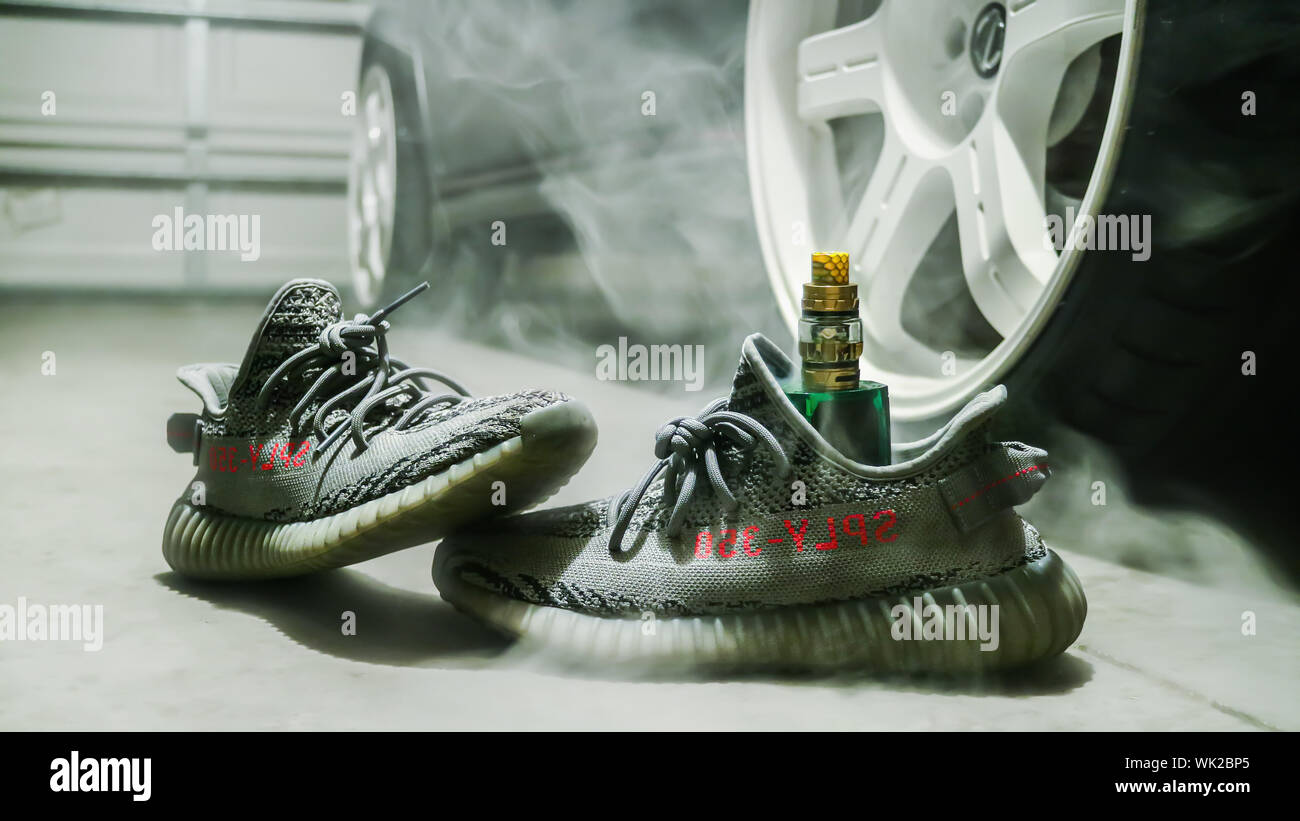 Adidas Yeezy 350 Beluga V2 with Vape Cloud Stock Photo - Alamy