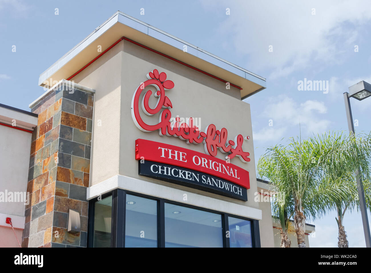 A store front sign for the chicken sandwich restaurant chain known as