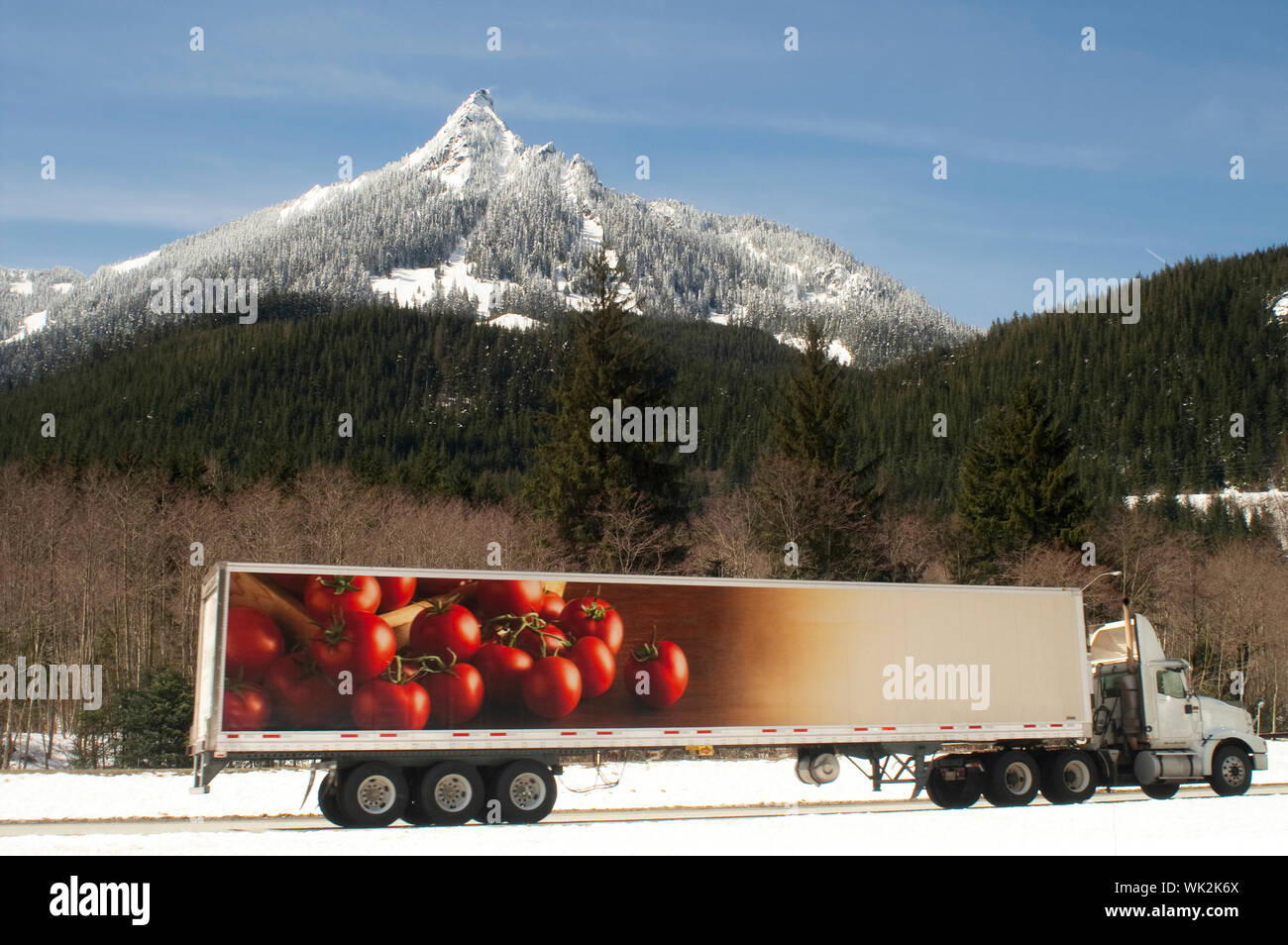 A fresh covering of snow blankets mountains over the pass on I90 Stock Photo Alamy