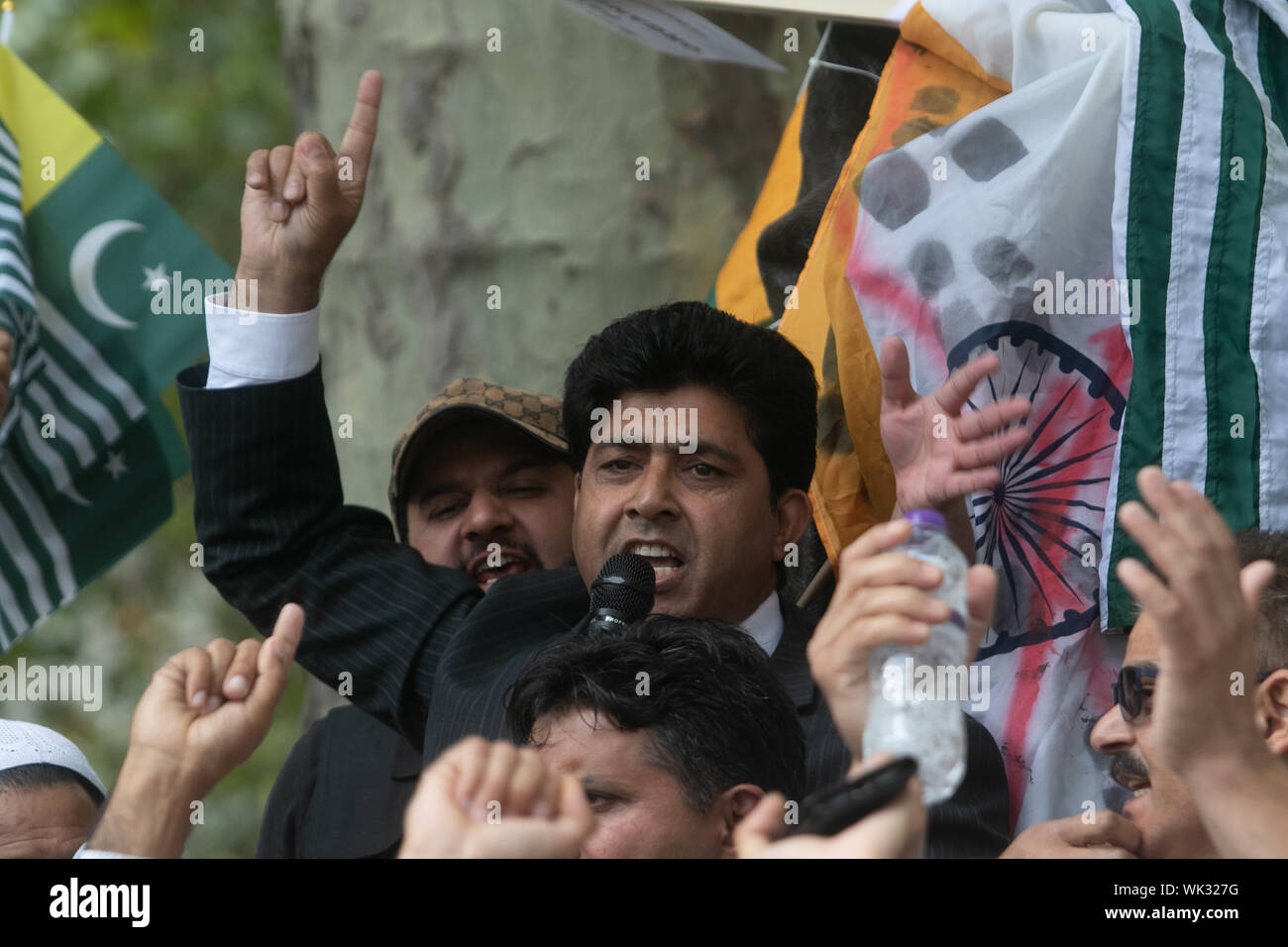 London, UK. 03rd Sep, 2019. A Pro Kashmir protester addresses in front of the statue of Gandhi in Parliament Square in solidarity with the people of Kashmir after Indian Prime Minister Narendra Modi delivered an Independence Day speech to remove the special rights of Kashmir as an autonomous region. Credit: SOPA Images Limited/Alamy Live News Stock Photo