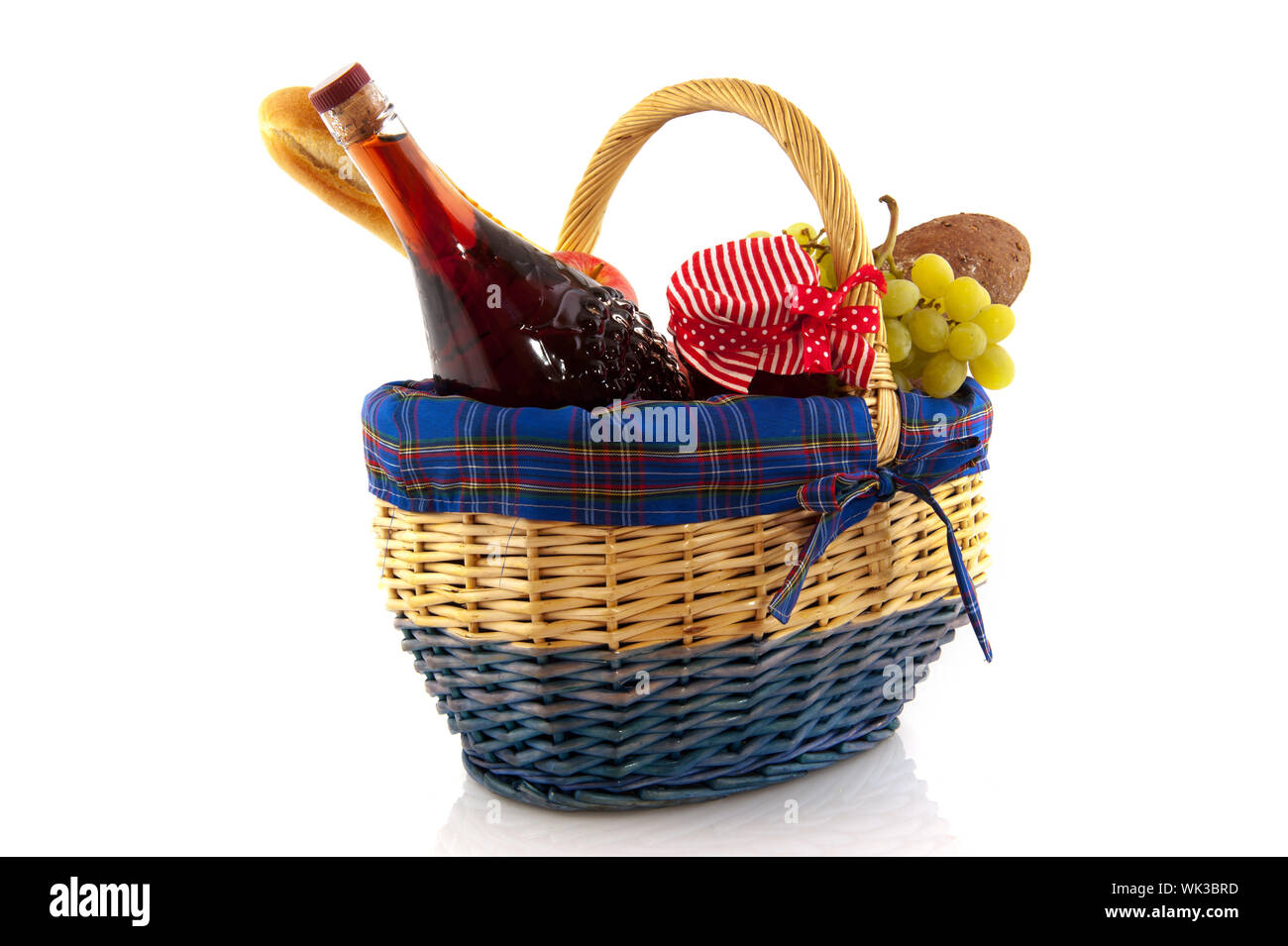 Blue and red picnic basket with bread fruit and wine Stock Photo - Alamy