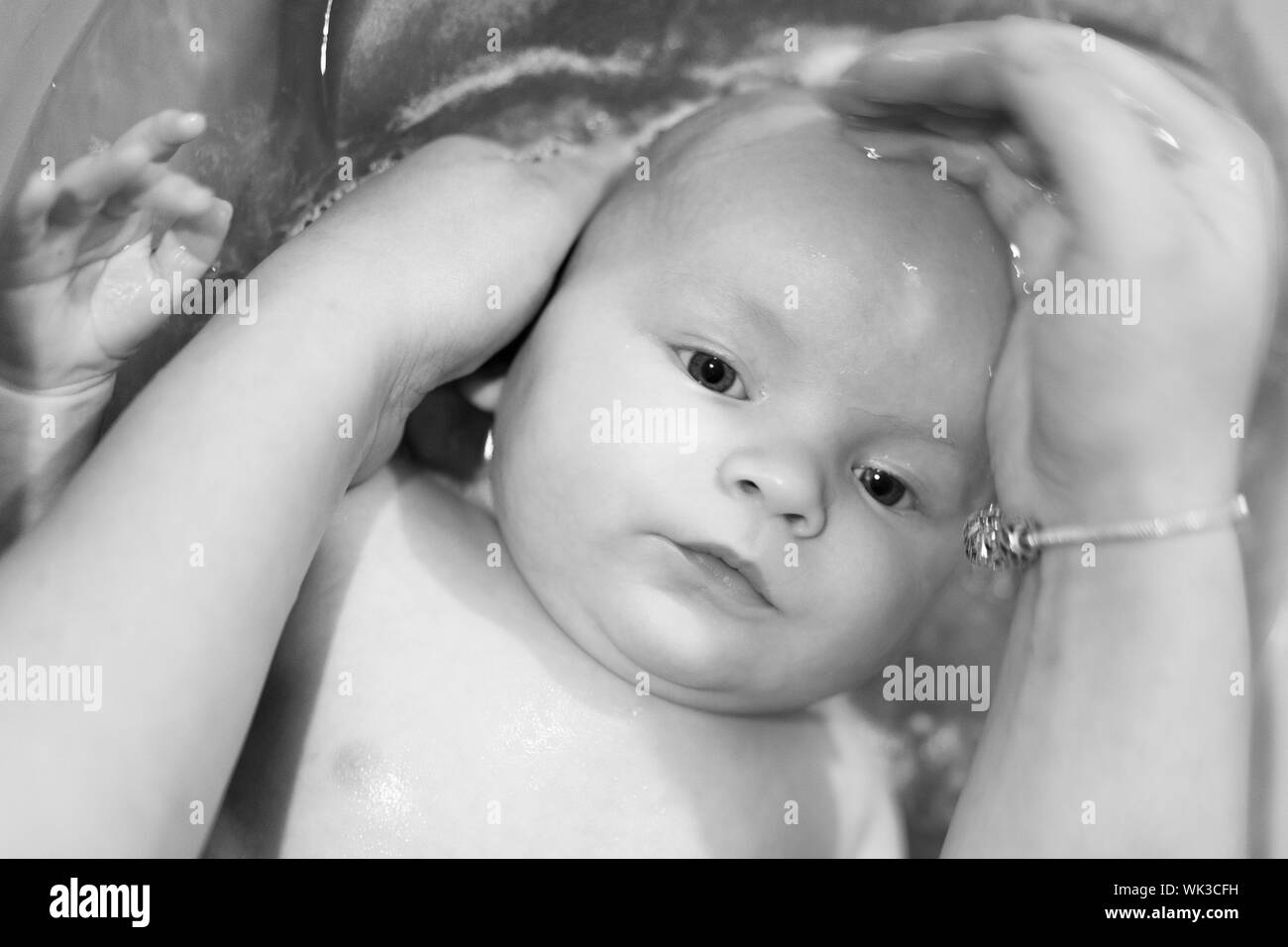 Mother giving son bath hi-res stock photography and images - Alamy