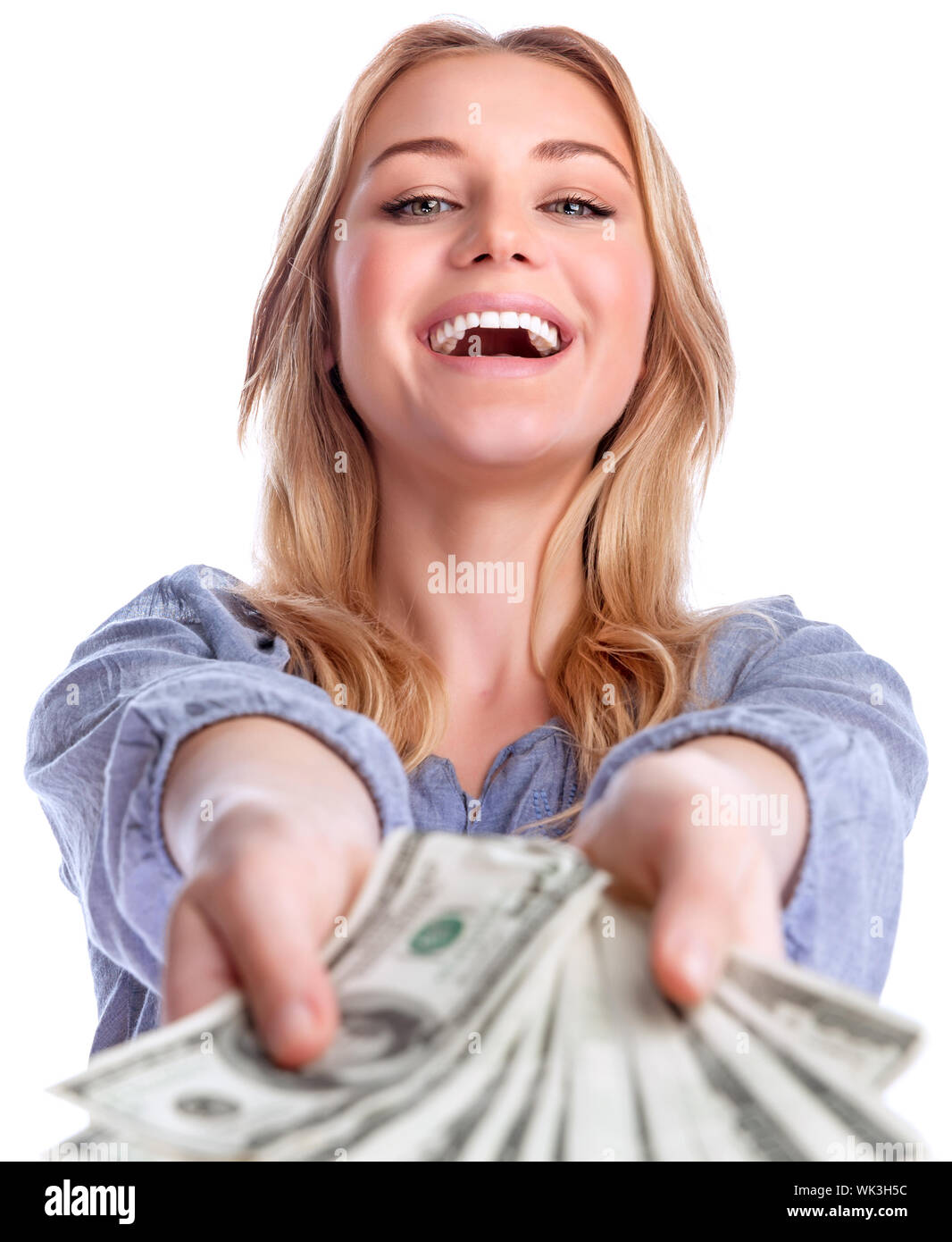 Portrait of attractive cheerful female showing many banknotes of one ...