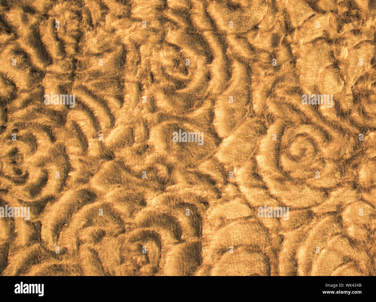 Gold brown abstract textile background. Roses pattern. Autumn textured design. Stock Photo