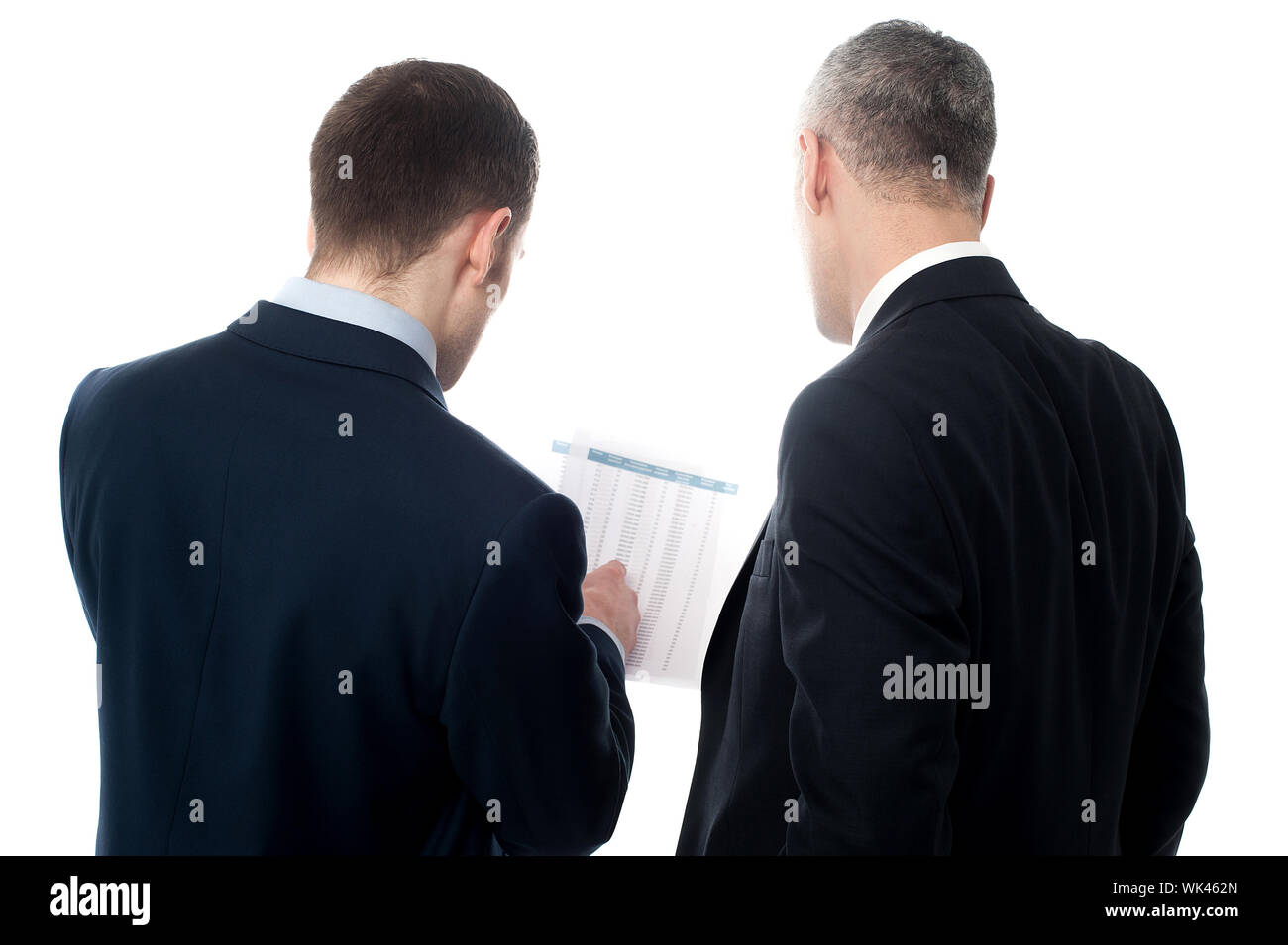 Businessmen analyzing the financial reports Stock Photo