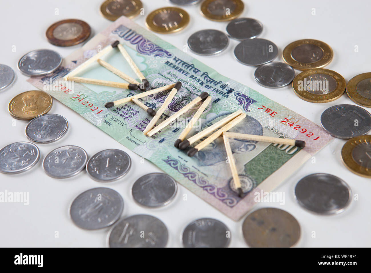 Bank made of matchsticks with Indian currencies Stock Photo Alamy