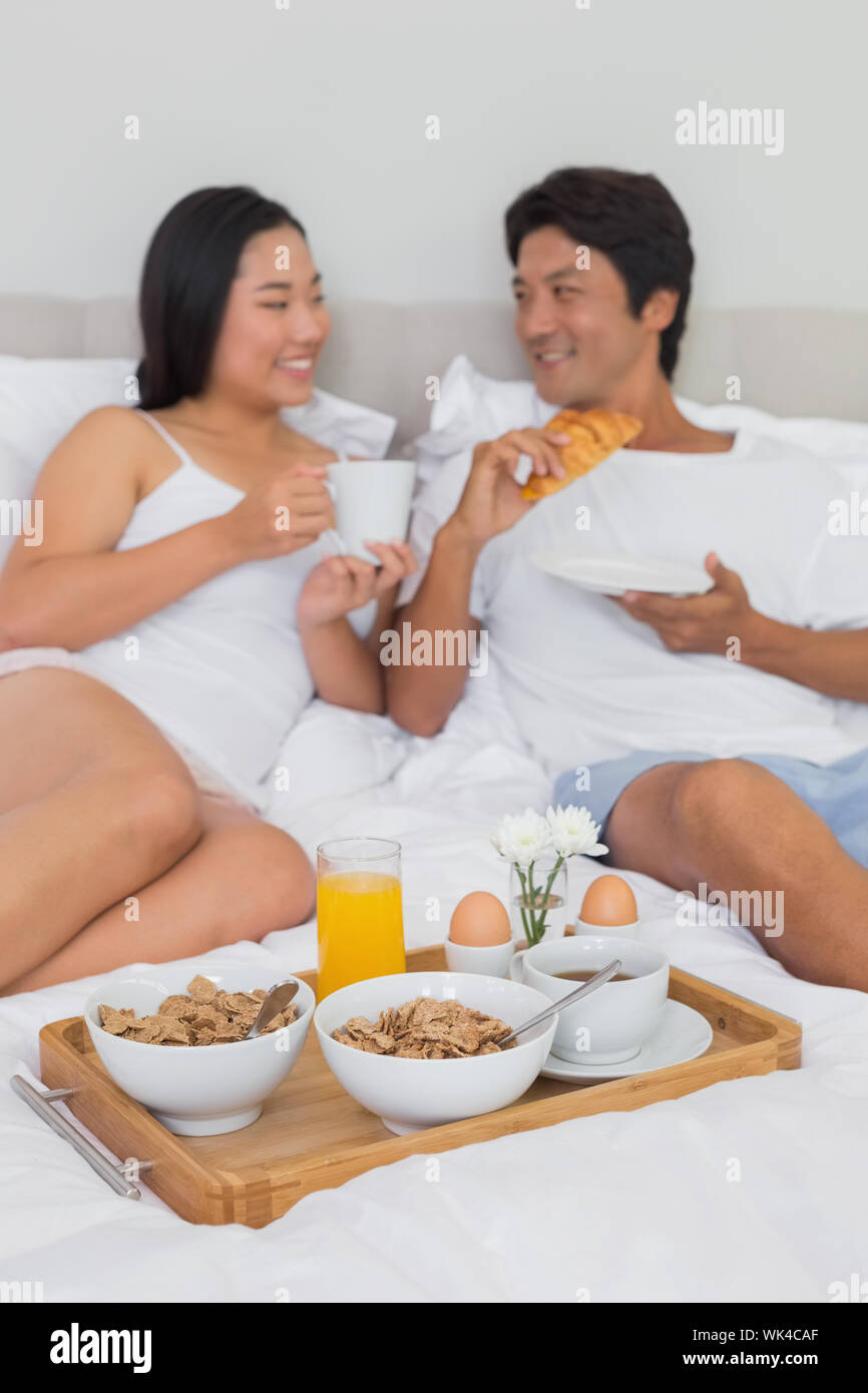 young-couple-having-tea-in-bed-hi-res-stock-photography-and-images-alamy