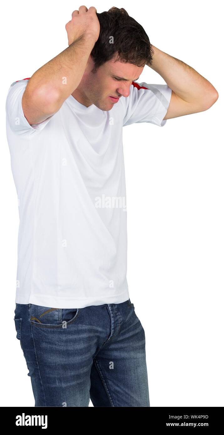 Disappointed football fan in white on white background Stock Photo - Alamy
