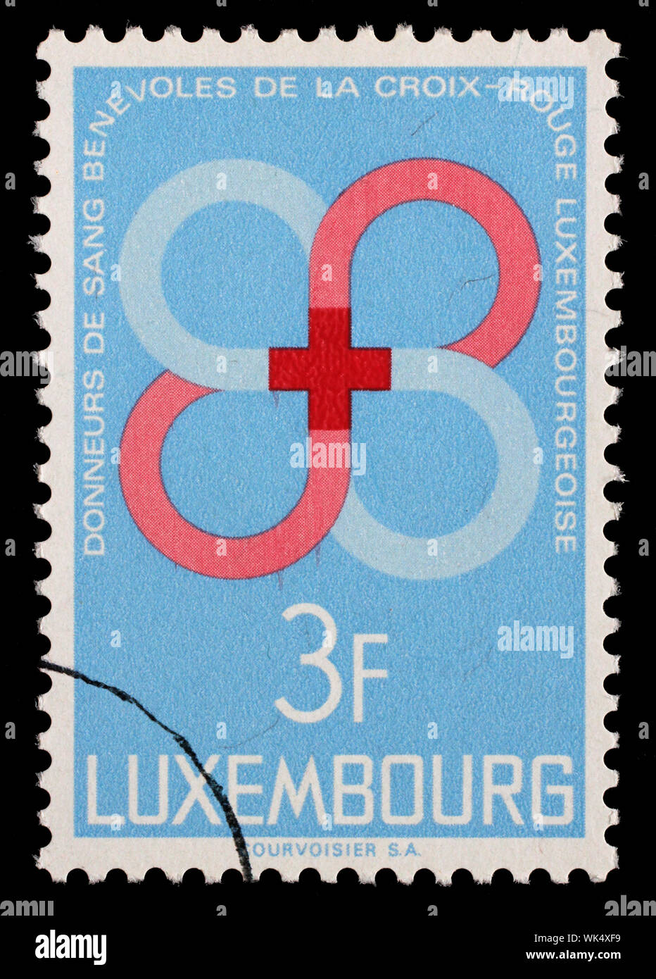 Stamp issued in Luxembourg shows Voluntary Blood Donors of the Luxembourg circa 1968. Stock Photo