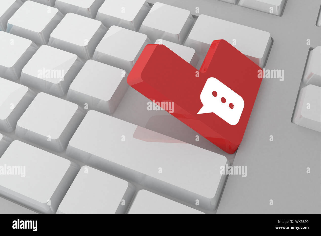 Speech bubble against white keyboard with red key Stock Photo Alamy