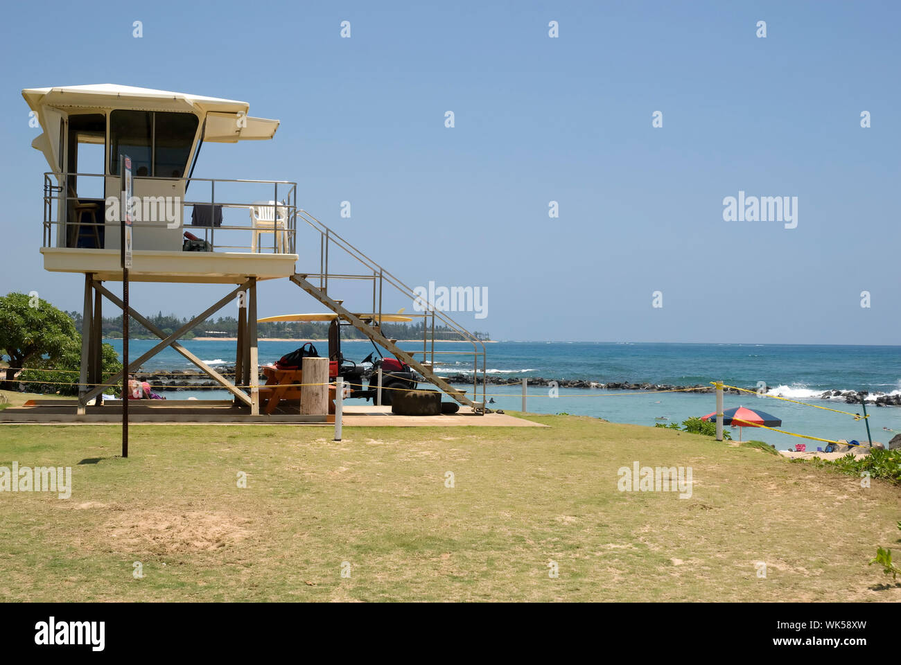 Watch Out Tower Against Calm Sea And Clear Sky Stock Photo